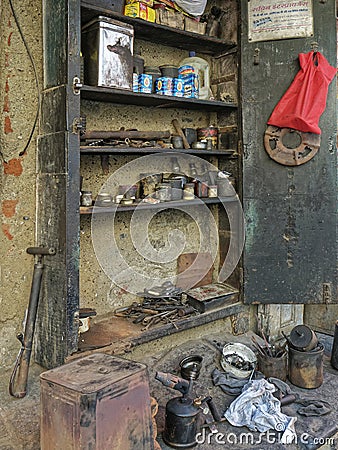 Vintage primus Kerosene Stove repairmanâ€™s shop at worli village Editorial Stock Photo
